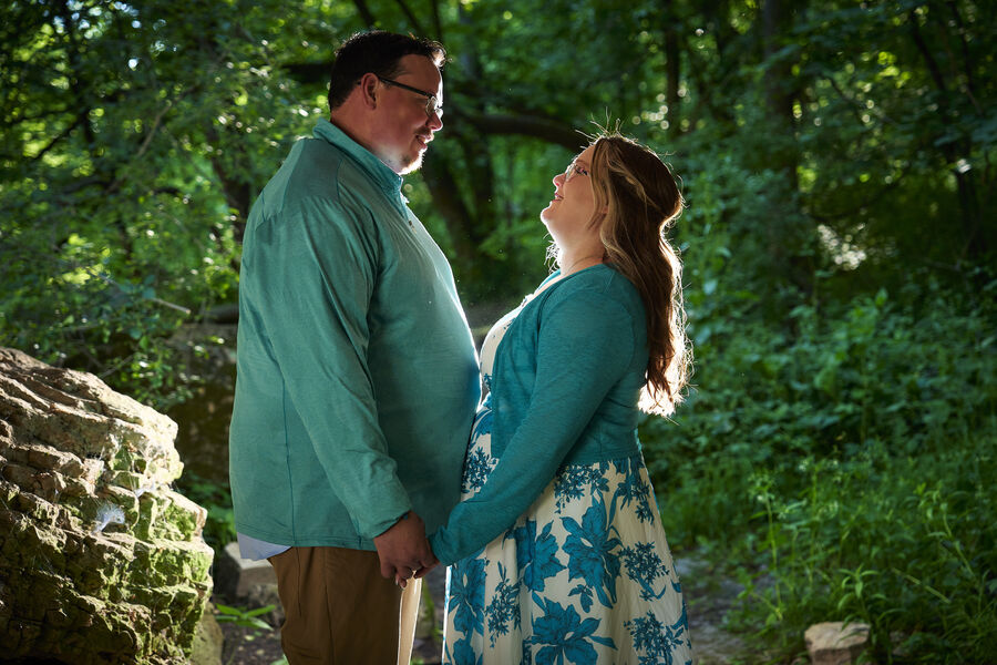 Kimberly and Stephen along a wooded trail
